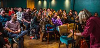 Eva Bindeman on stage at Belly Laughs at the Famous Royal Navy Volunteer